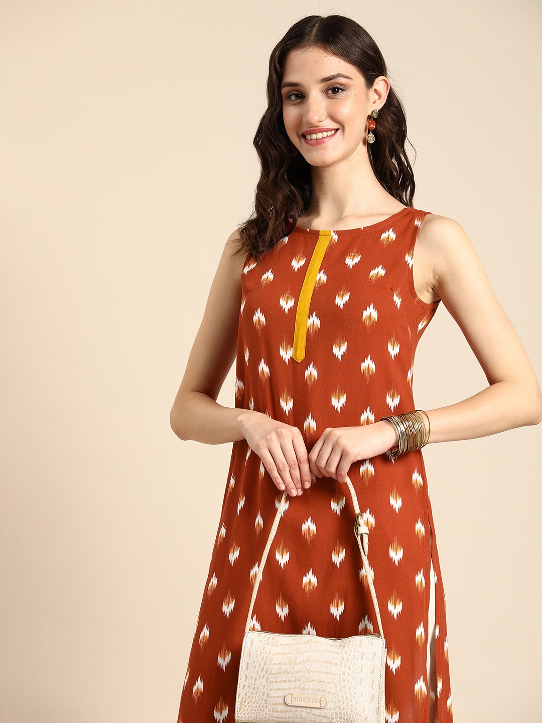 

Anouk Abstract Printed Round Neck Knee Length Straight Kurta, Rust