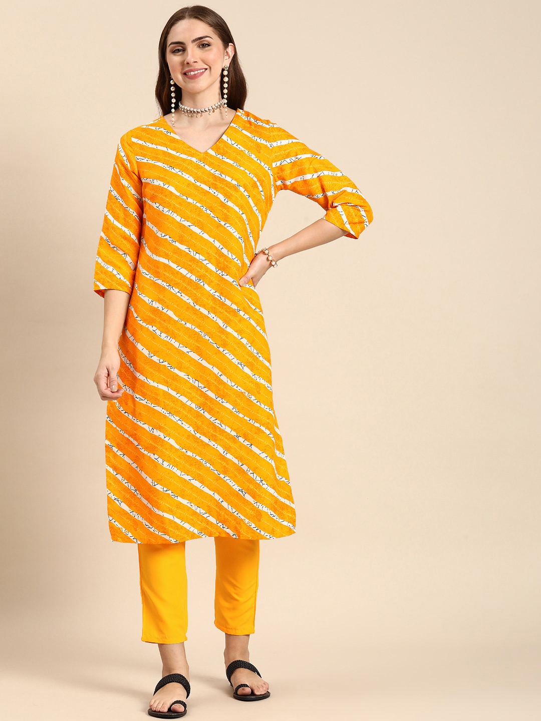 

Anouk Striped And Printed Regular Kurta with Trousers, Mustard