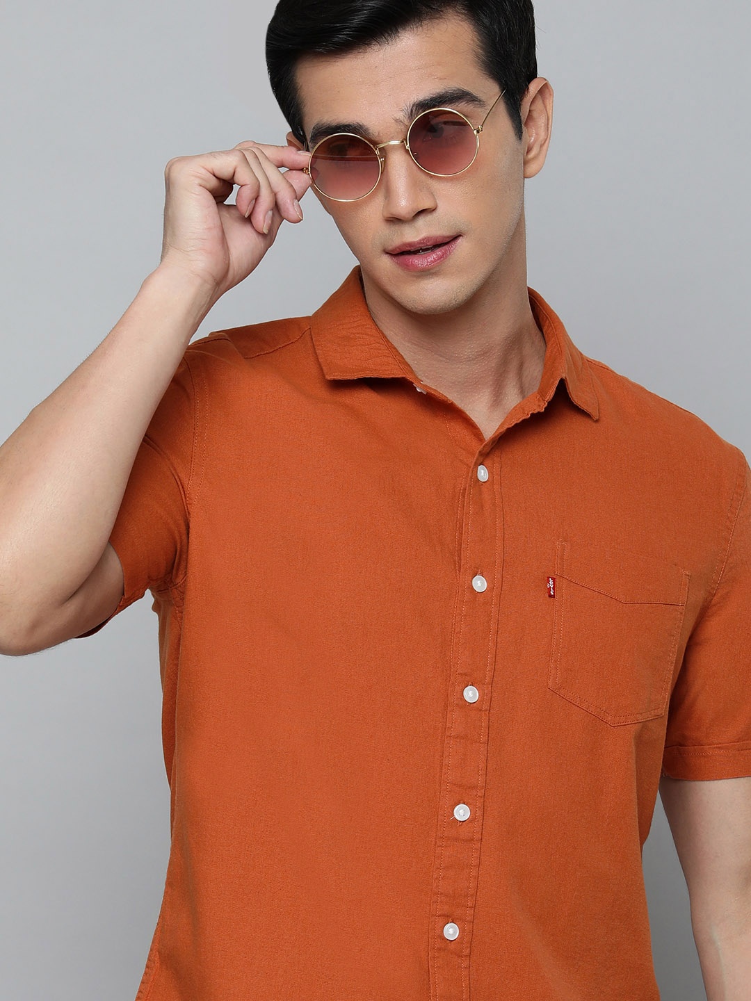 

Levis Men Pure Cotton Solid Slim Fit Opaque Casual Shirt, Rust