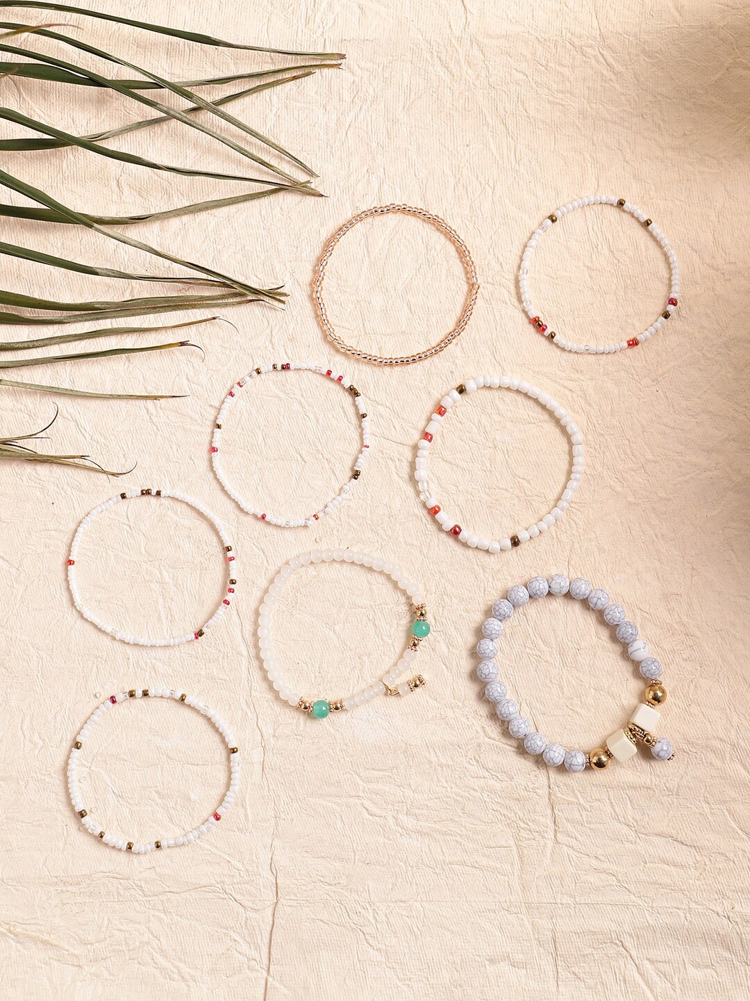 

SOHI Women Set Of 8 Gold-Plated Elasticated Bracelet, White