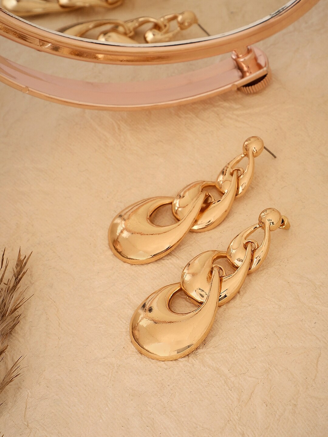 

SOHI Gold-Plated Contemporary Drop Earrings