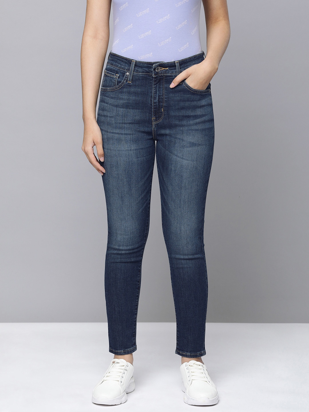

Levis 721 Skinny Fit High-Rise Light Fade Jeans, Blue