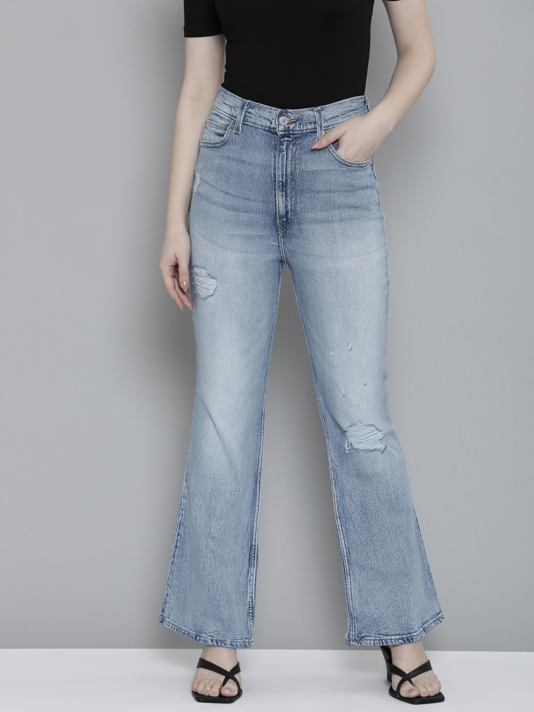 

Levis Women Flared High-Rise Mildly Distressed Heavy Fade Acid Wash Stretchable Jeans, Blue