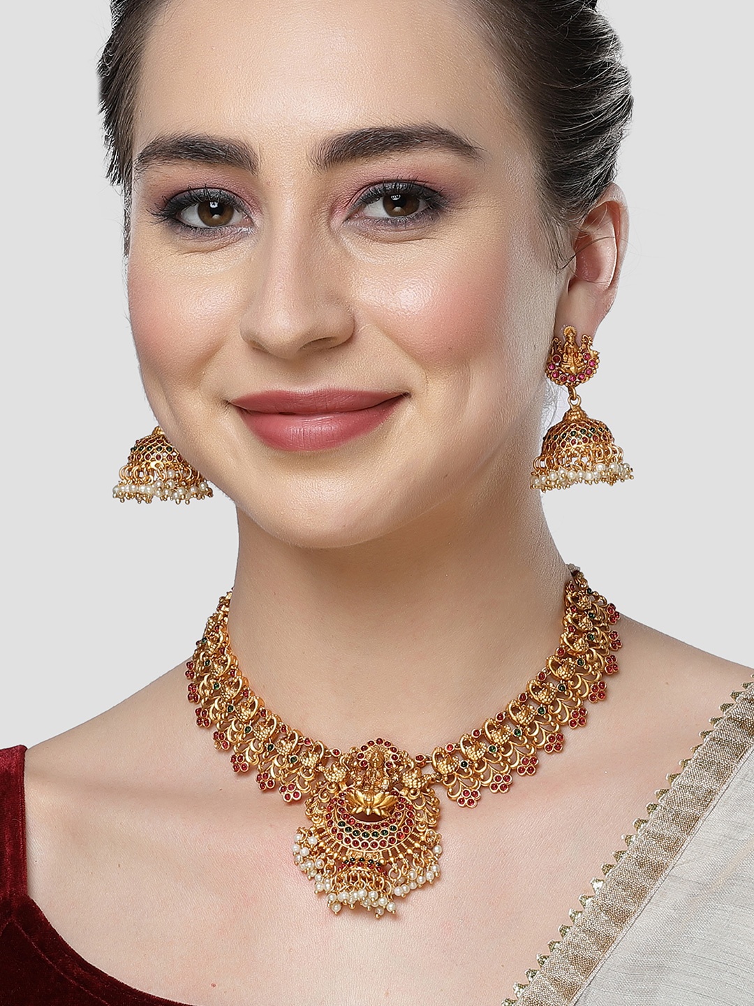 

KARATCART Gold-Plated Stone Studded & Beaded Jewellery Set