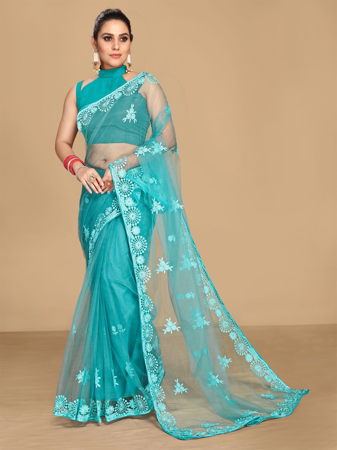

VAIRAGEE Embellished Embroidered Net Saree, Turquoise blue