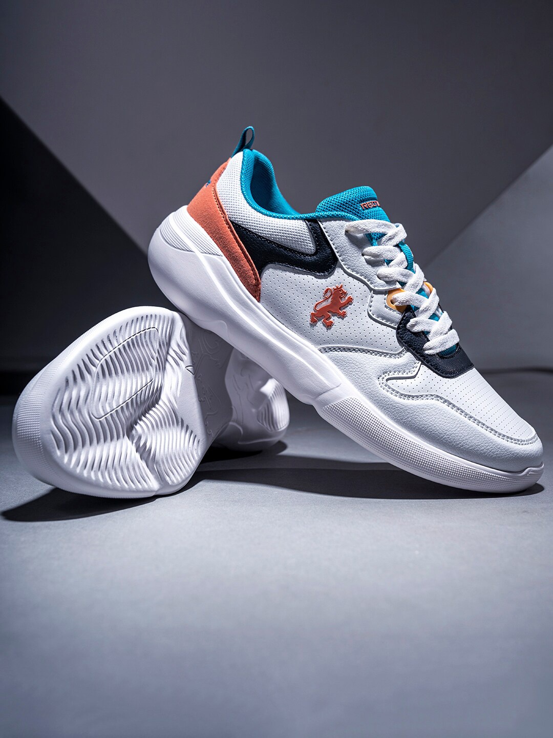 

Red Tape Men Colourblocked Perforated Sneakers, White