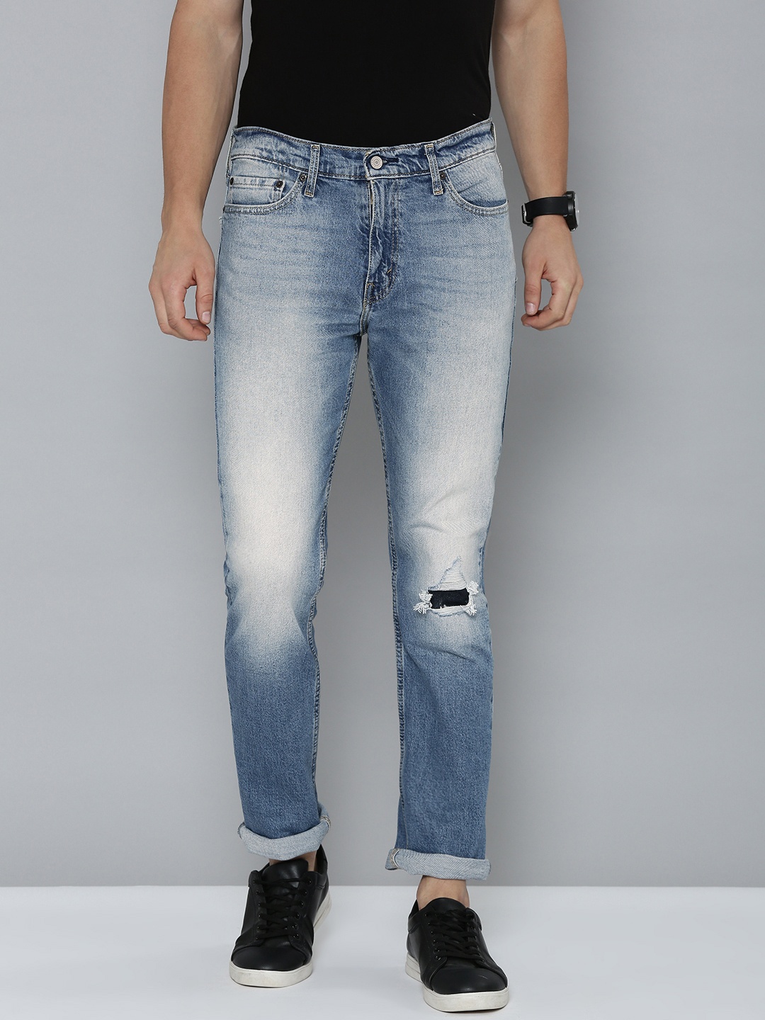 

Levis Men Slim Fit Mildly Distressed Heavy Fade Stretchable Mid-Rise Jeans, Blue