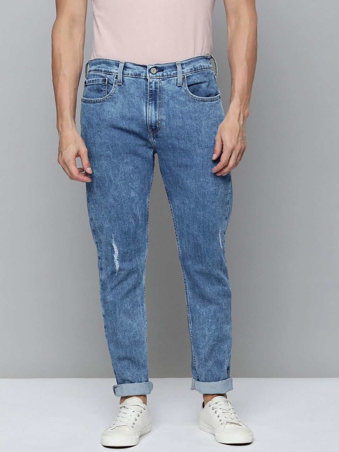 

Levis Men 512 Tapered Fit Low-Rise Low Distress Acid Wash Stretchable Jeans, Blue