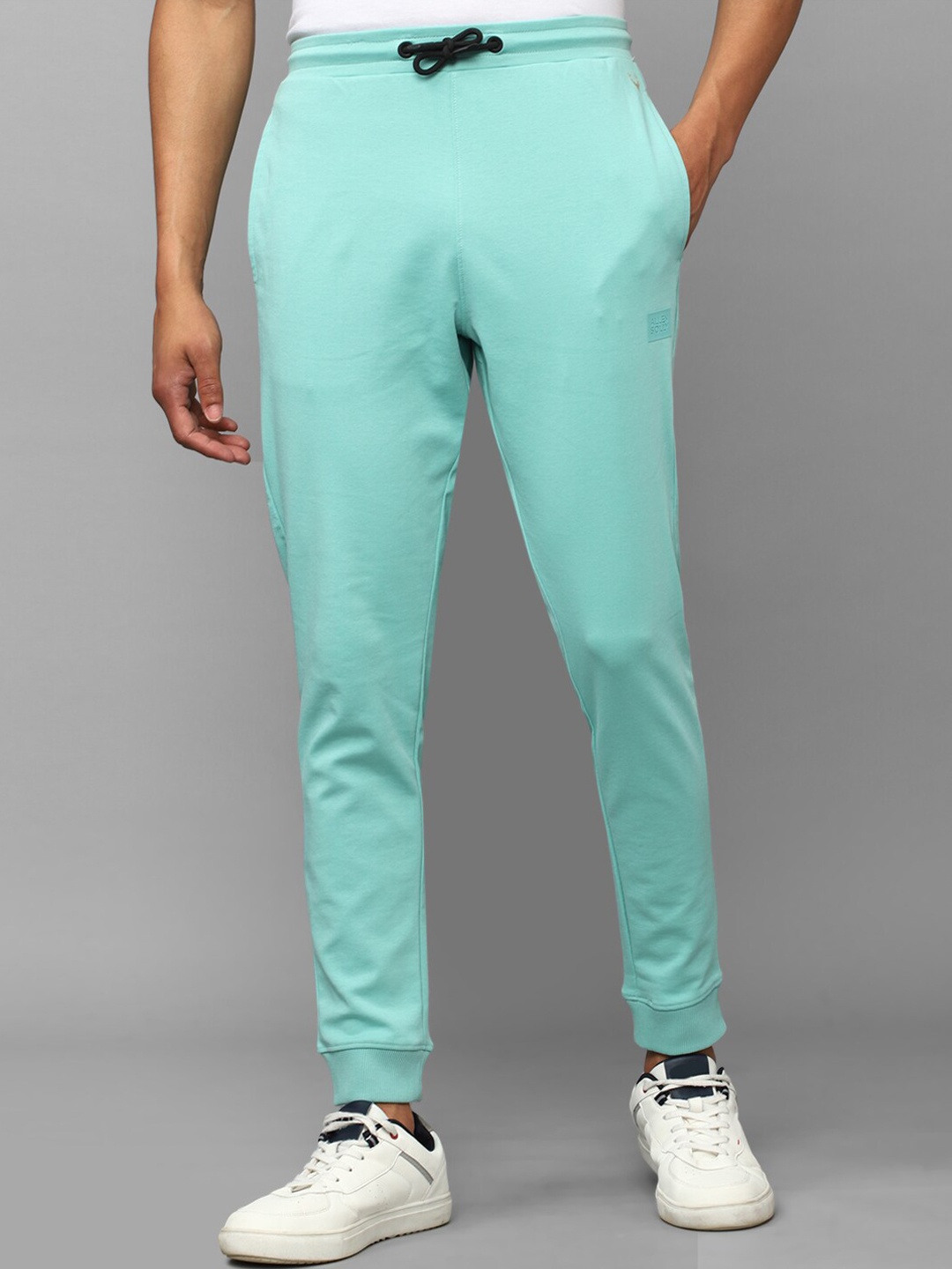

Allen Solly Tribe Men Regular Fit Mid Rise Joggers, Turquoise blue