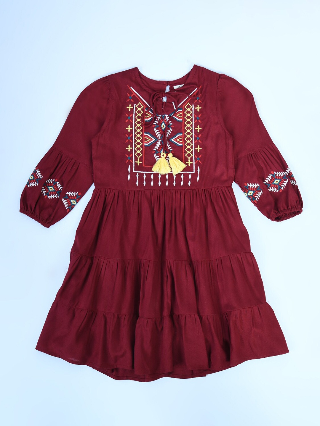 

Bella Moda Girls Tie-Up Neck Ethnic Motifs Embroidered Pure Cotton A-Line Dress, Maroon