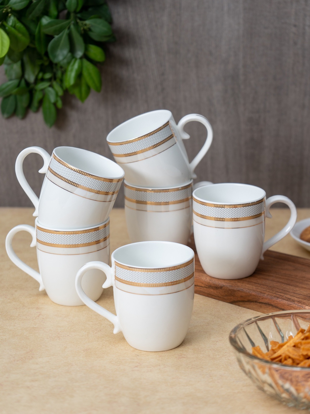 

JCPL Ebony White & Gold Toned 6 Pcs Printed Ceramic Glossy Mugs 180 ml Each