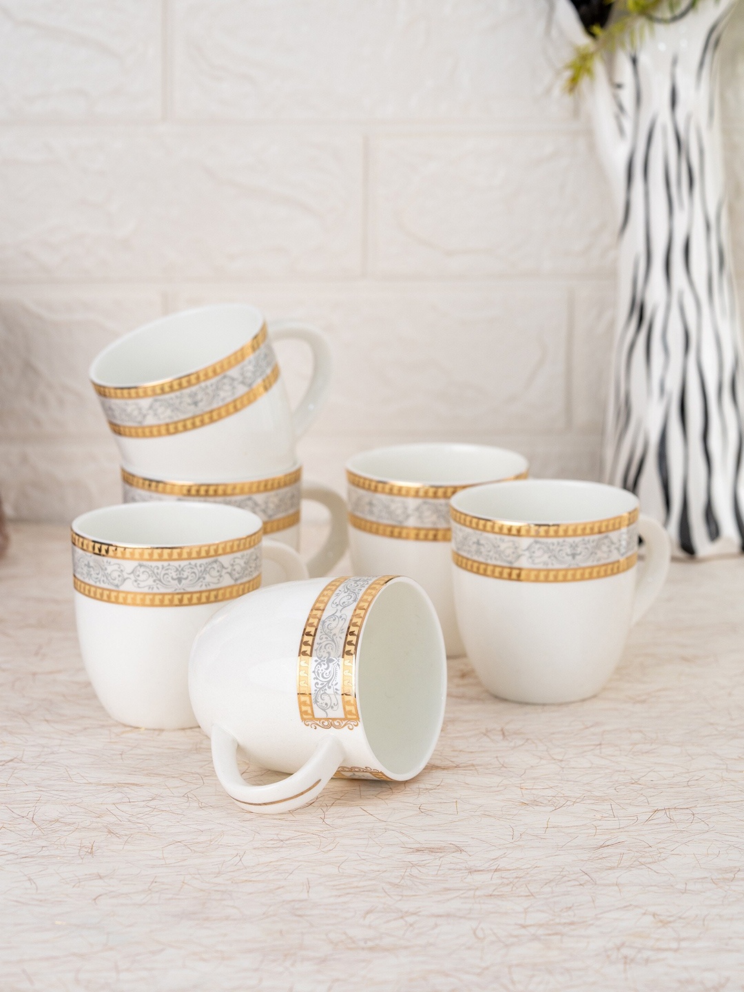 

JCPL White & Gold-Toned 6 Pcs Printed Ceramic Glossy Mugs 180 ml Each