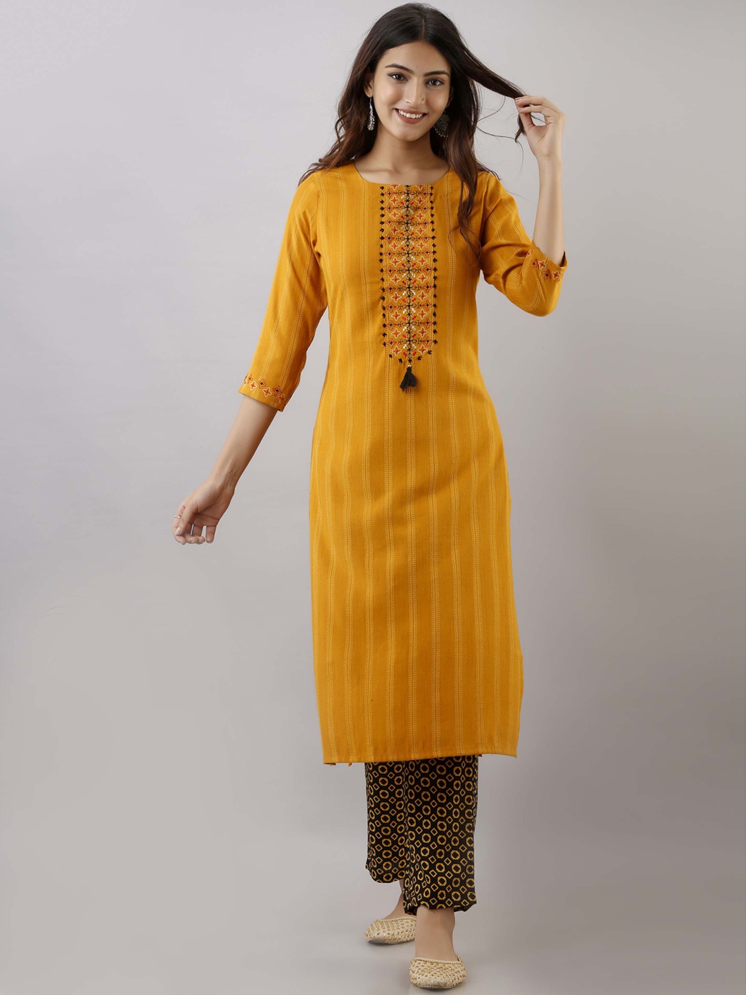 

Pankvi Straight Embroidered Kantha Work Kurta with Trousers, Mustard