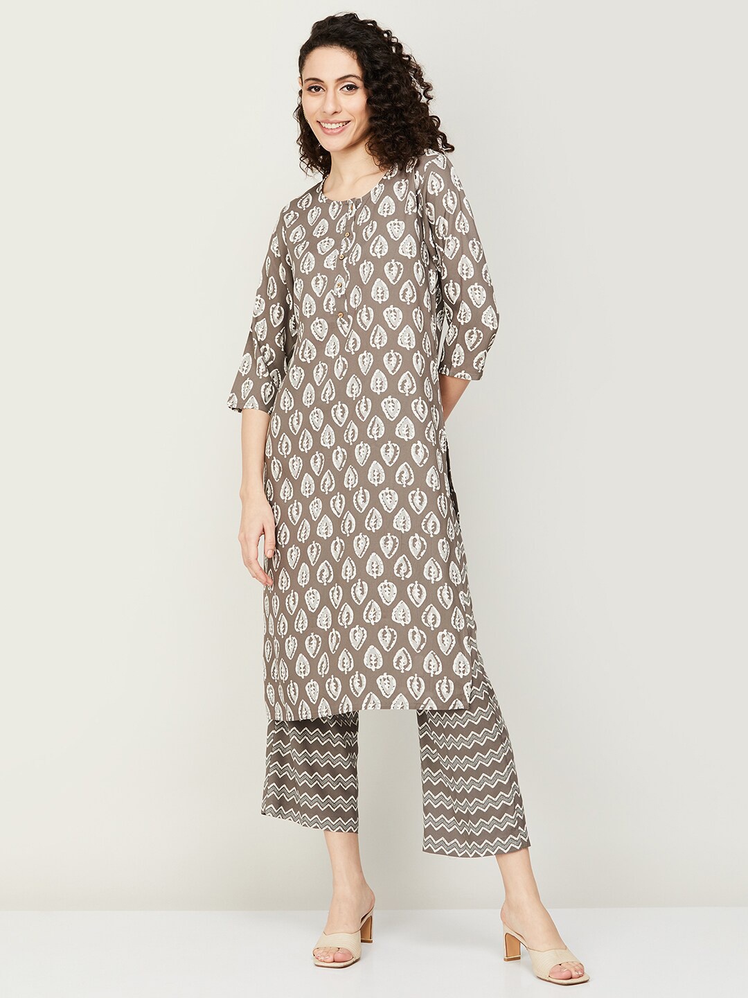 

Melange by Lifestyle Round Neck Ethnic Motifs Printed Kurta With Palazzos, Brown