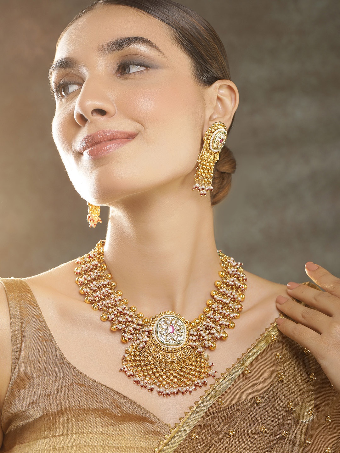 

Rubans 22K Gold Plated Kundan Studded & Pearls Beaded Traditional Jewellery Set