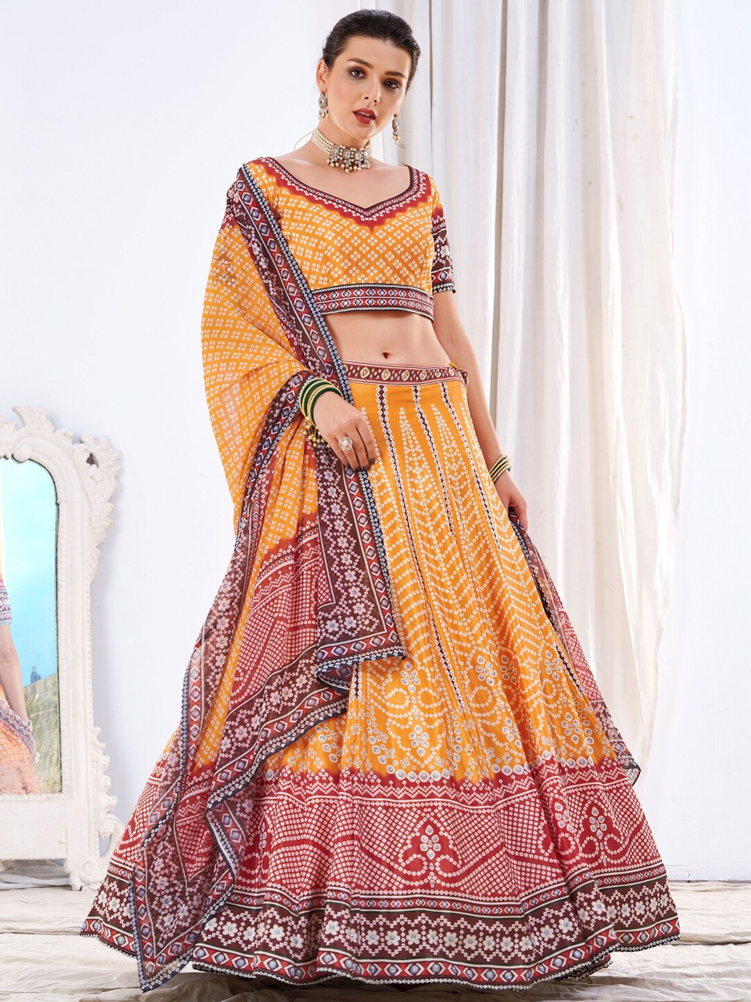 

Chhabra 555 Bandhani Printed Lehenga Choli With Chiffon Dupatta, Mustard
