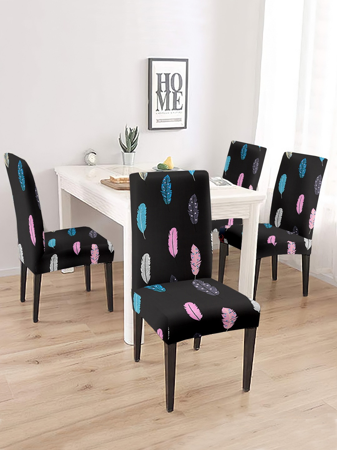 

Cortina Black & Pink 4 Pcs Feather Printed Super Stretchable Chair Covers