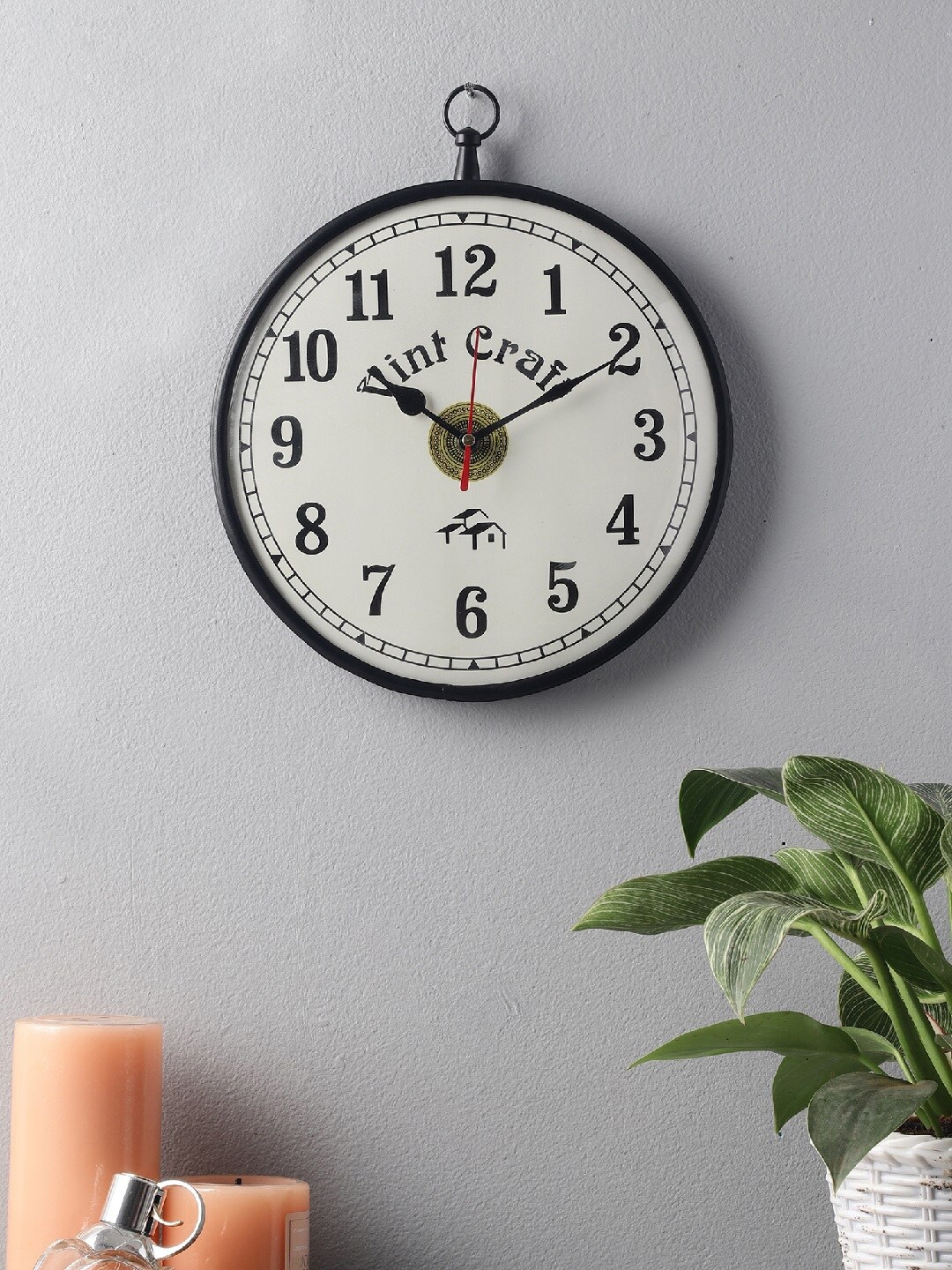 

EXIM DECOR Black & Off White Vintage Wall Clock