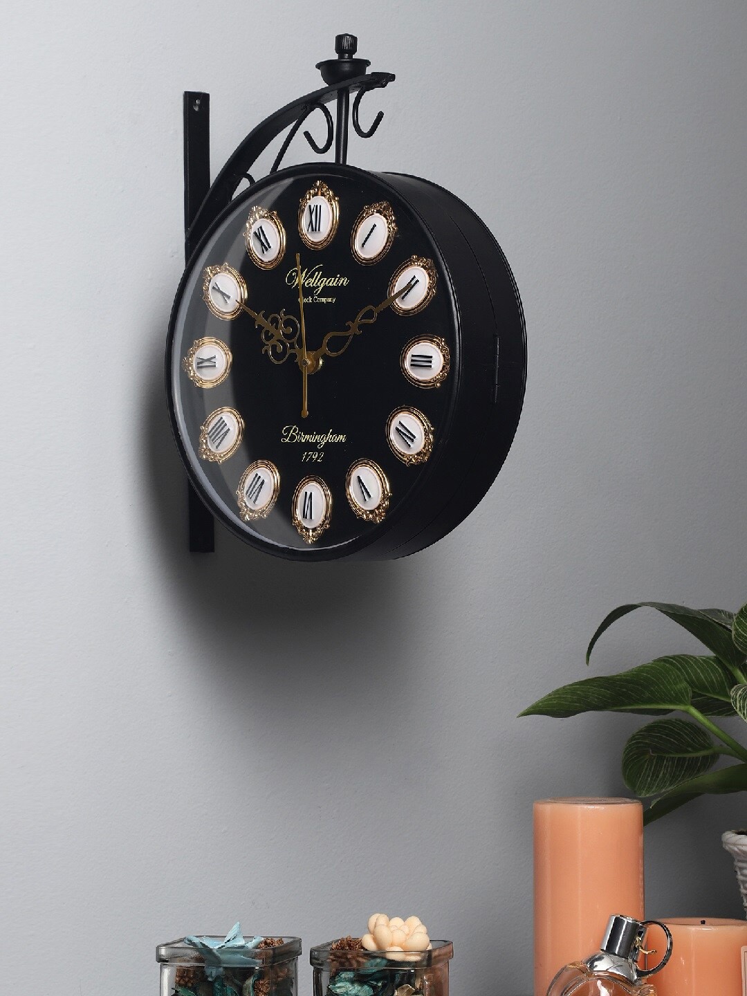 

EXIM DECOR Black & Gold-Toned Textured Vintage Wall Clock