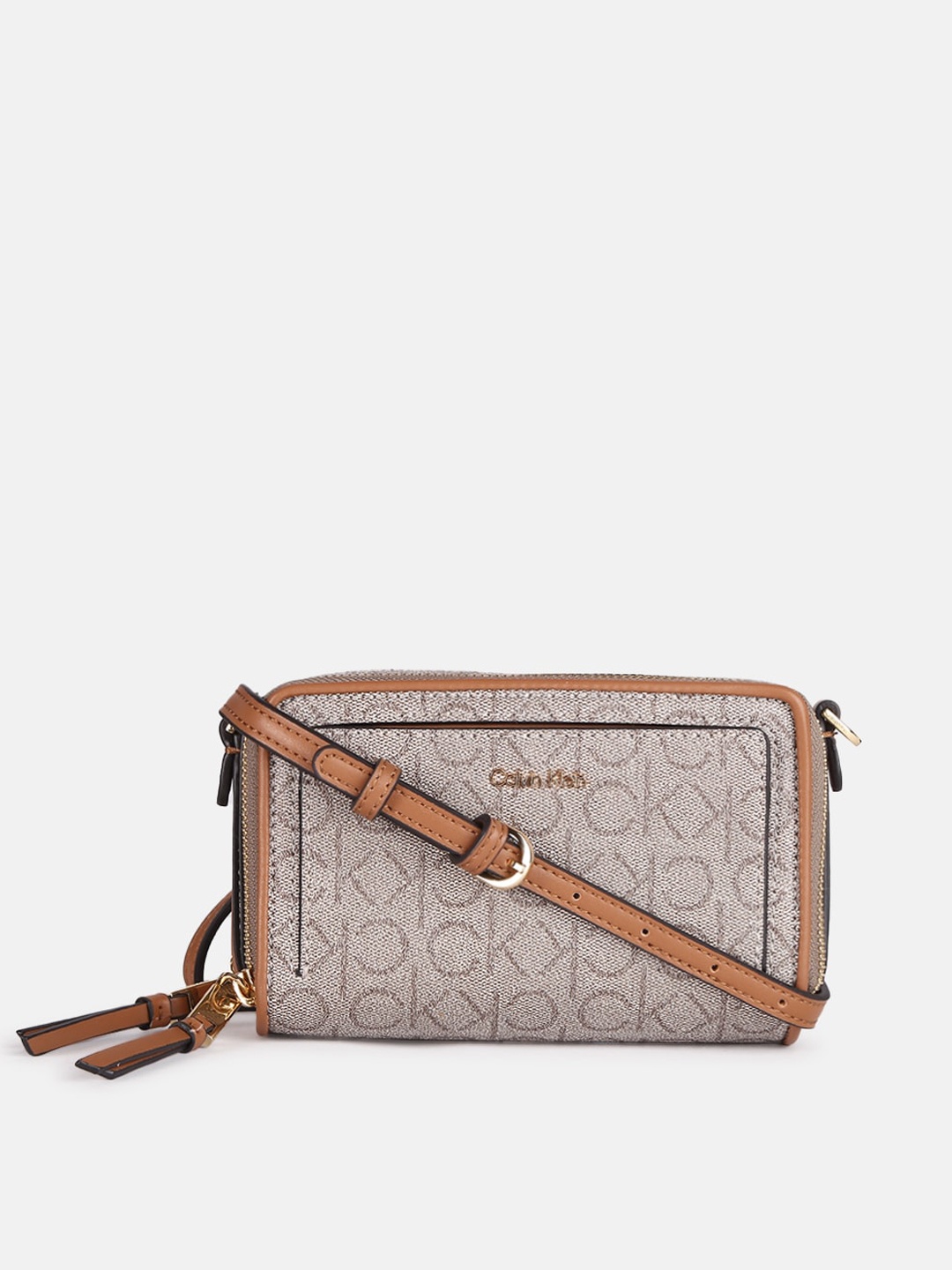 

Calvin Klein Jeans Brand Logo Printed Swagger Sling Bag with Tasselled, Beige
