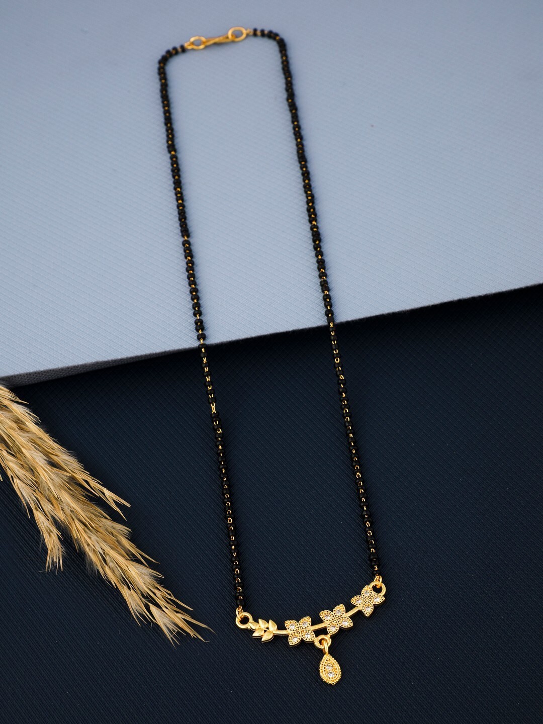 

Vita Bella Gold-Plated Stone-Studded & Beaded Flower Motif Alloy Mangalsutra, Black