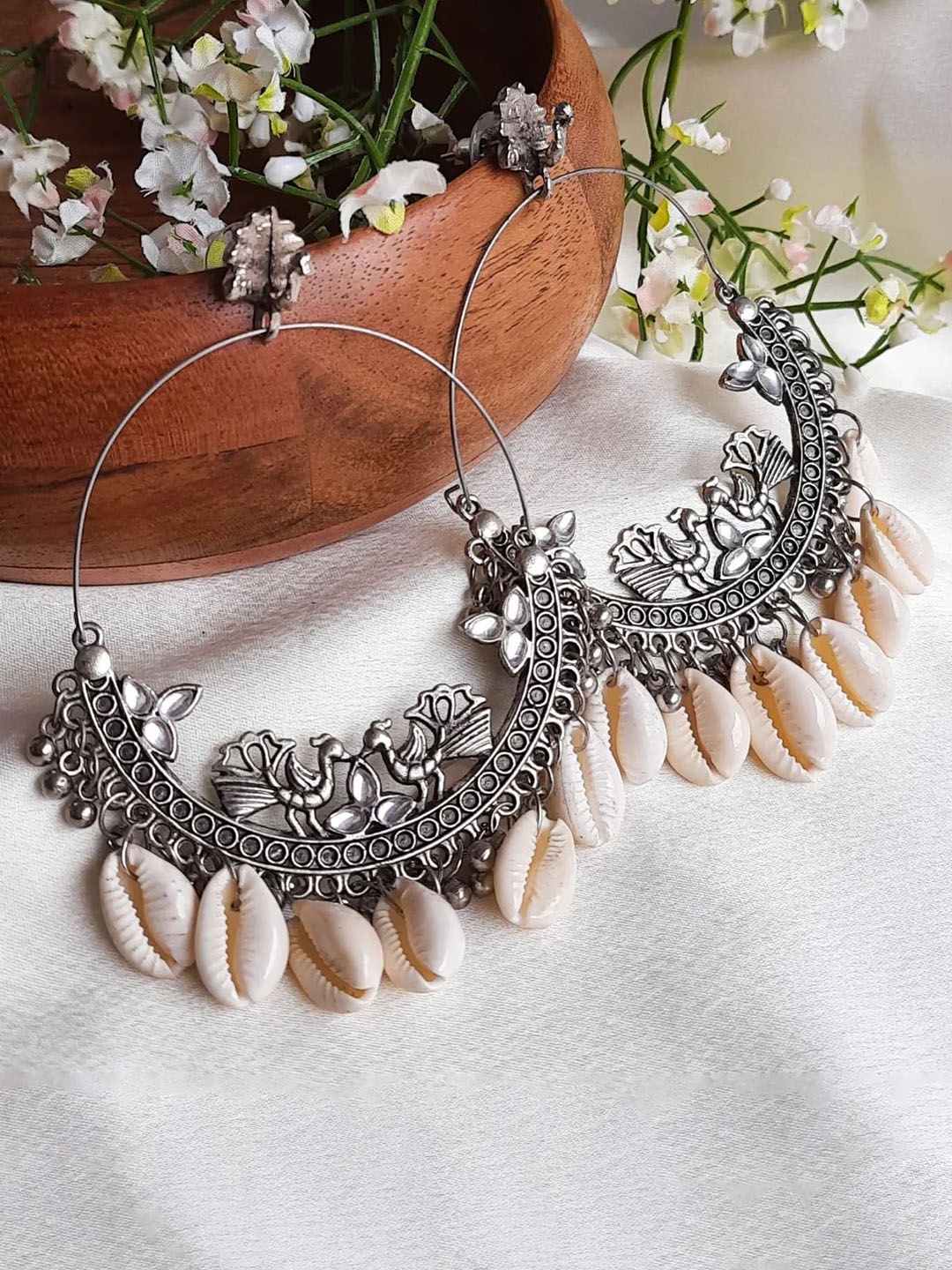 

Krelin Silver-Plated Oxidised Peacock Shaped Chandbalis Earrings, White