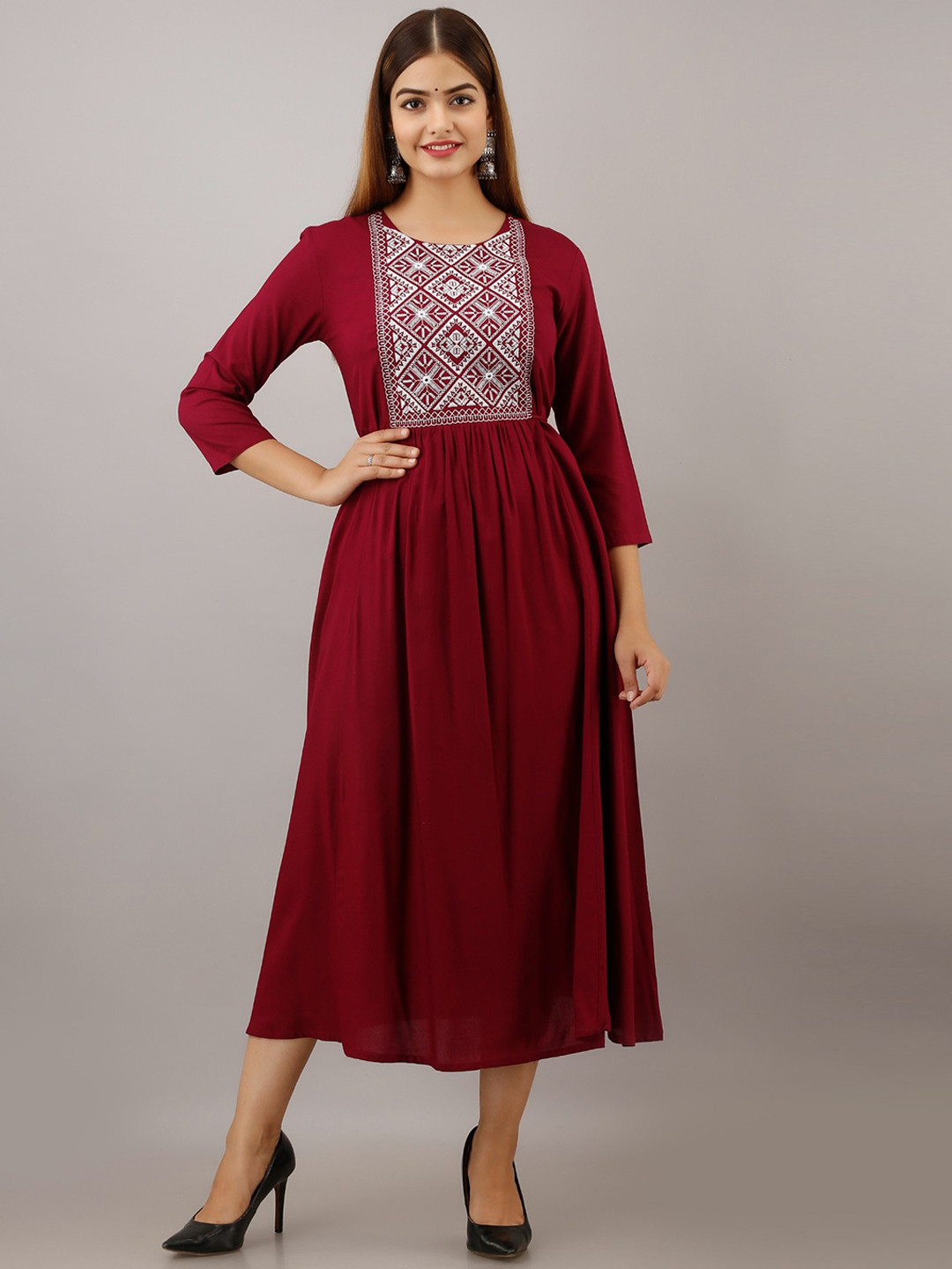 

Women Touch Yoke Design Embroidered A-Line Kurta, Maroon
