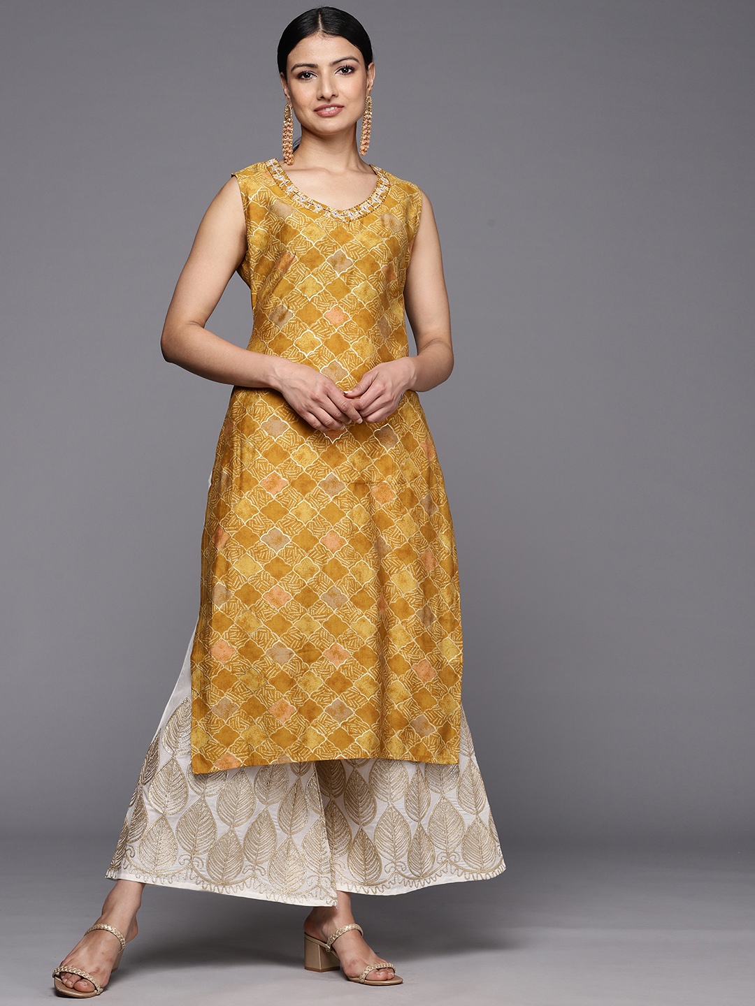 

Libas Ethnic Motifs Printed Zari Kurta, Mustard