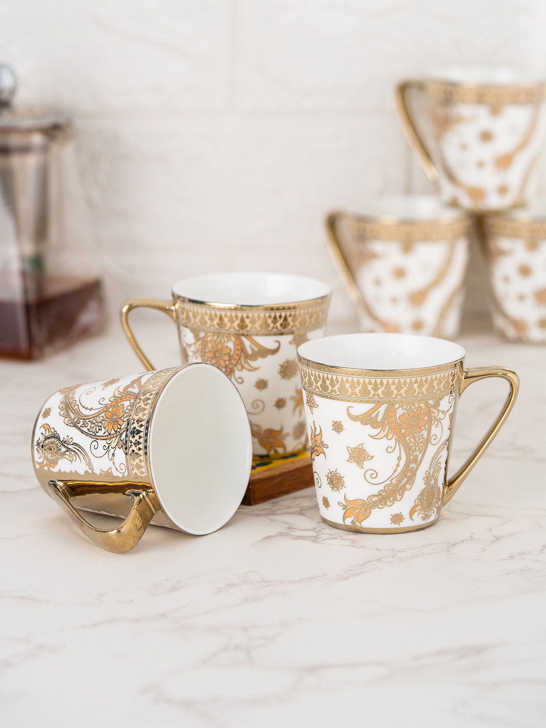 

CLAY CRAFT White & Gold-Toned 6 Pcs Ethnic Motifs Printed Ceramic Glossy Cups 180 ml each