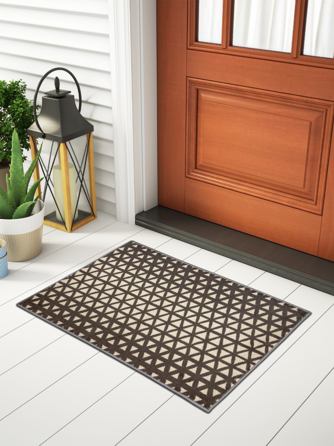 

Welspun Brown & Cream Geometric Printed 1306 GSM Anti-Skid Doormat