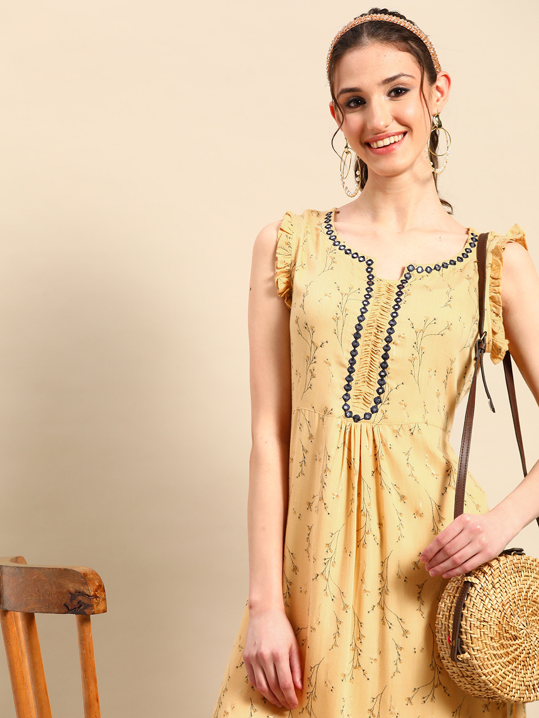 

Sangria Floral Printed Mirror Work Kurta With Palazzos, Yellow