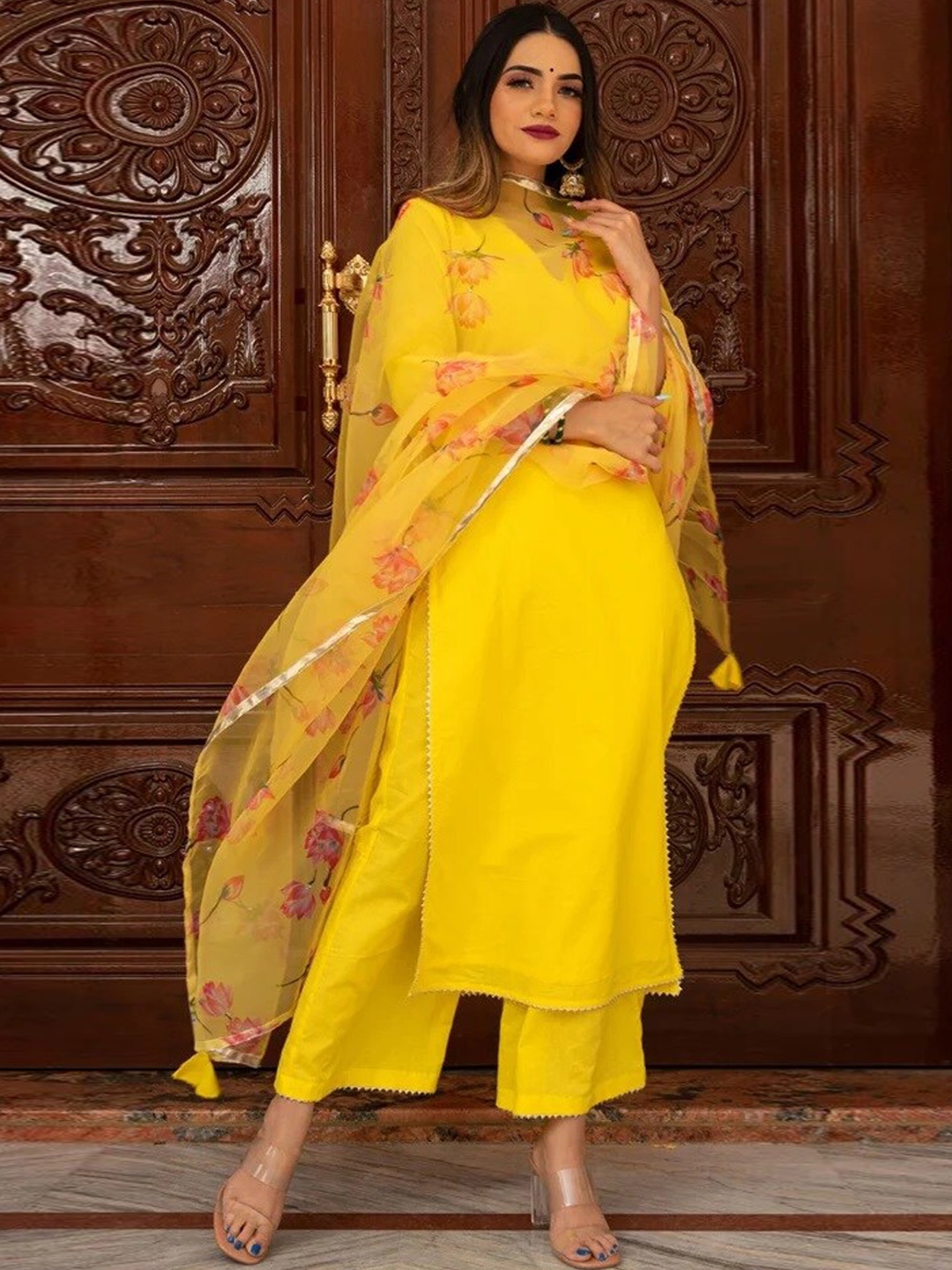 

Pomcha Women Yellow Floral Kurta with Trousers & With Dupatta