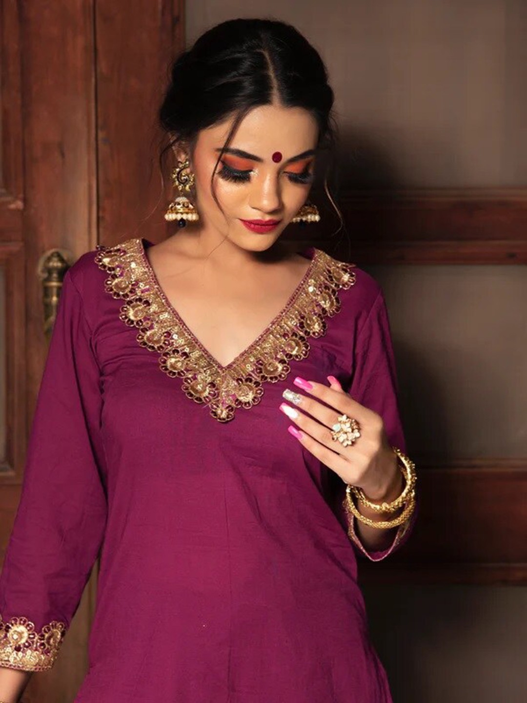 

Pomcha Women Burgundy Floral Embroidered Kurta with Trousers & With Dupatta