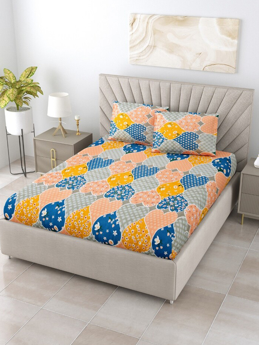 

Salona Bichona Yellow & Blue Printed 144 TC Queen Bedsheet With 2 Pillow Covers