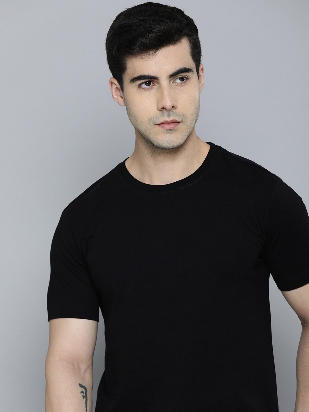 

ether Men Solid T-shirt, Black