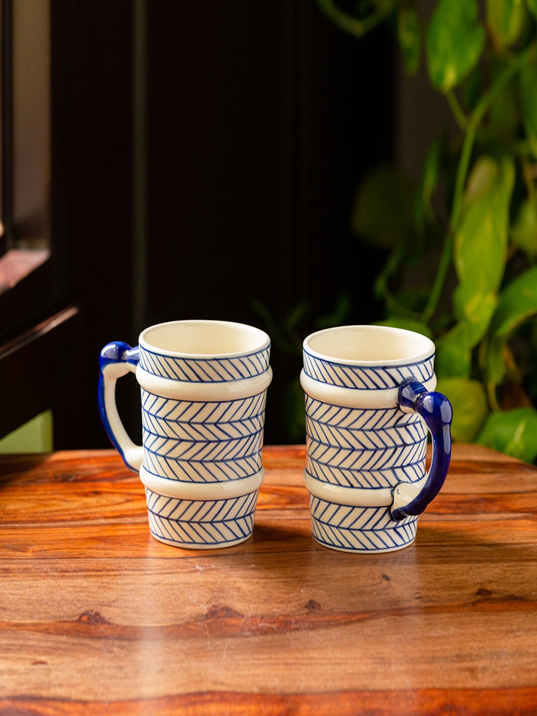 

ExclusiveLane White & Blue 2 Pcs Chevron Hand-Painted Ceramic Milk Beer Mugs 510 ml Each