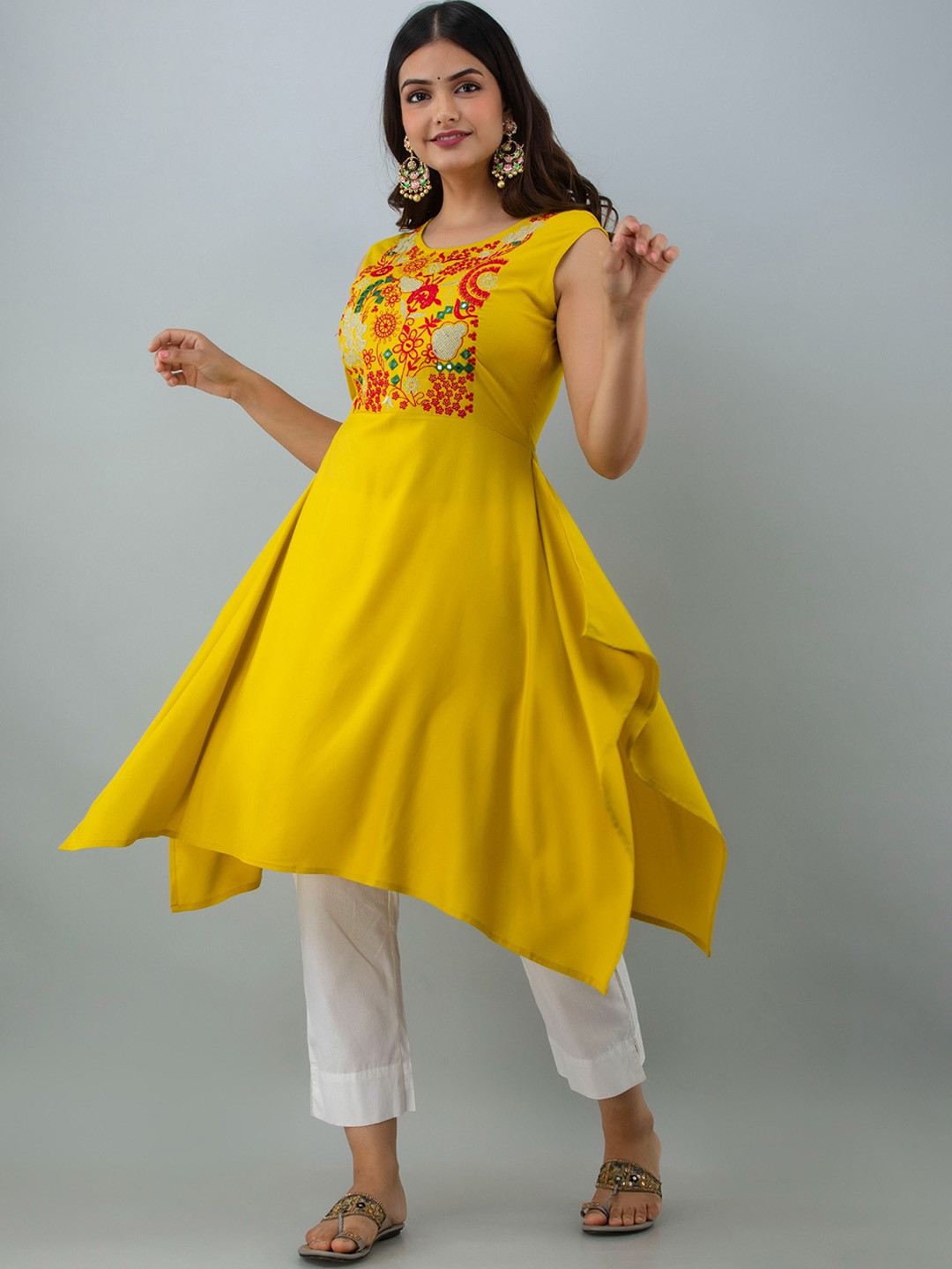 

Women Touch Yoke Design Thread Work Asymmetric Kurta, Mustard