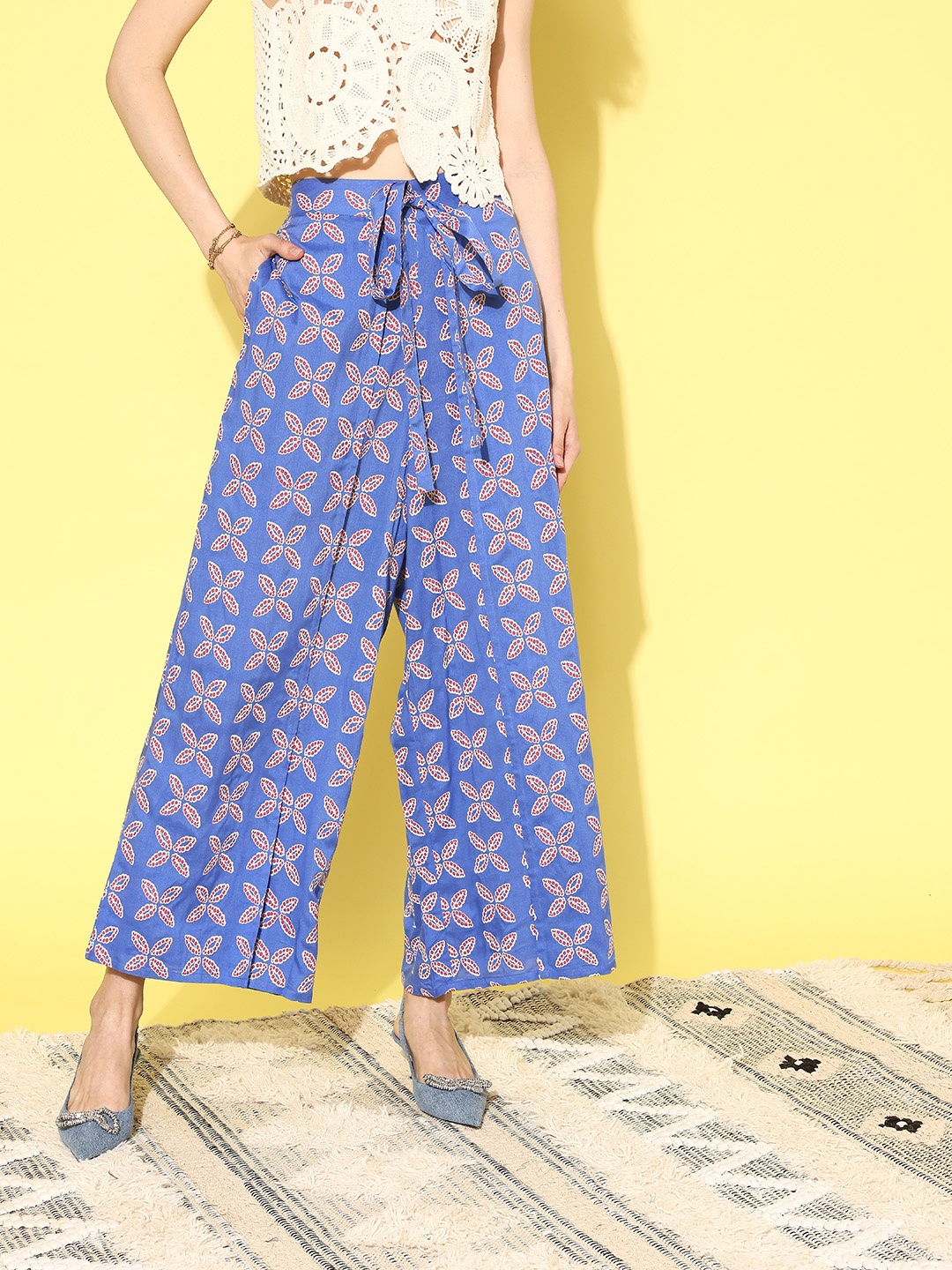 

Sangria Women Blue & Gold-Toned Ethnic Motifs Printed Flared Ethnic Palazzos