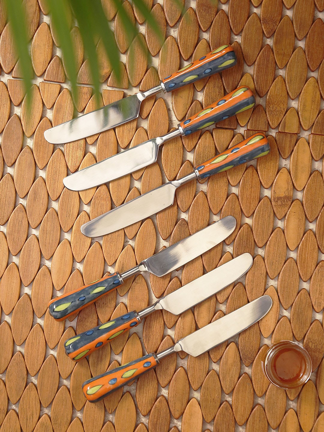 

ExclusiveLane The Mughal Aakar Orange & Grey 6-Pcs Stainless Steel & Ceramic Table Knives