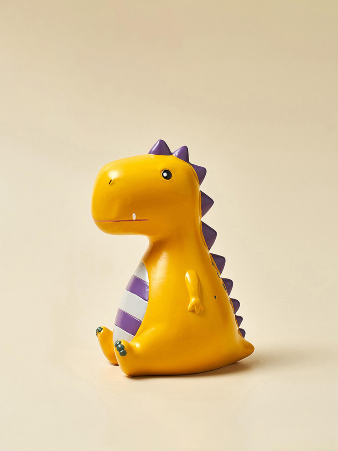 

Nestasia Yellow Dino Decor Showpieces