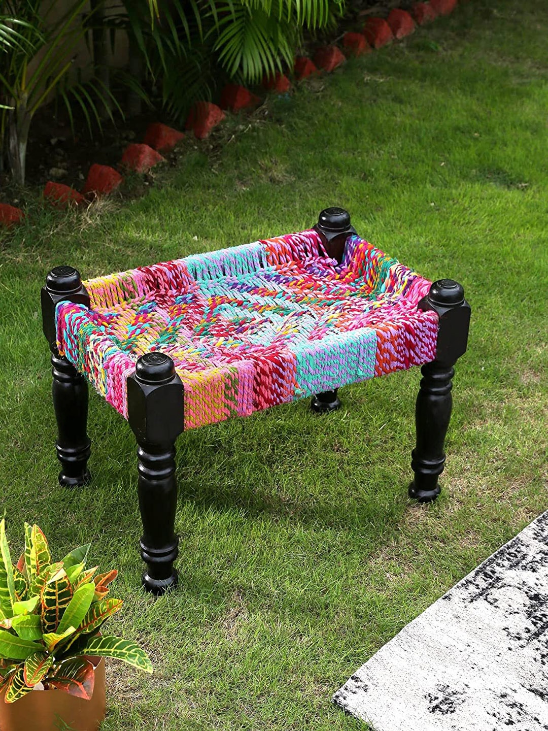 

Amoliconcepts Black & Pink Chindi Weaving Wooden Stool