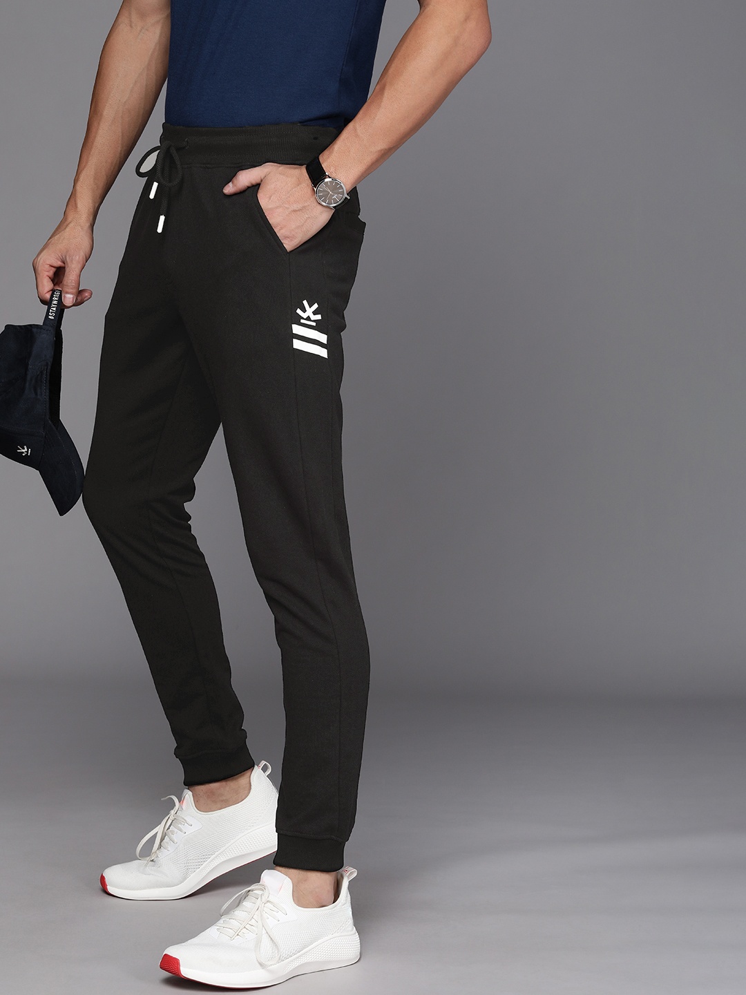 

WROGN Men Brand Logo Printed Mid Rise Knitted Joggers, Black