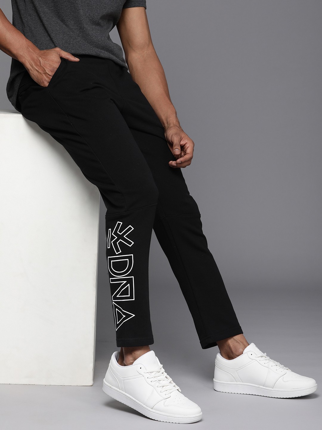 

WROGN Men Brand Logo Printed Detail Regular Fit Track Pants, Black