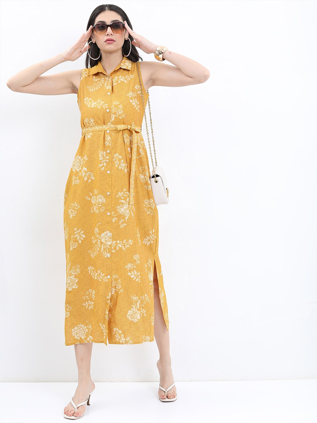 

Vishudh Mustard Yellow Floral Tie-Up Neck A-Line Midi Dress