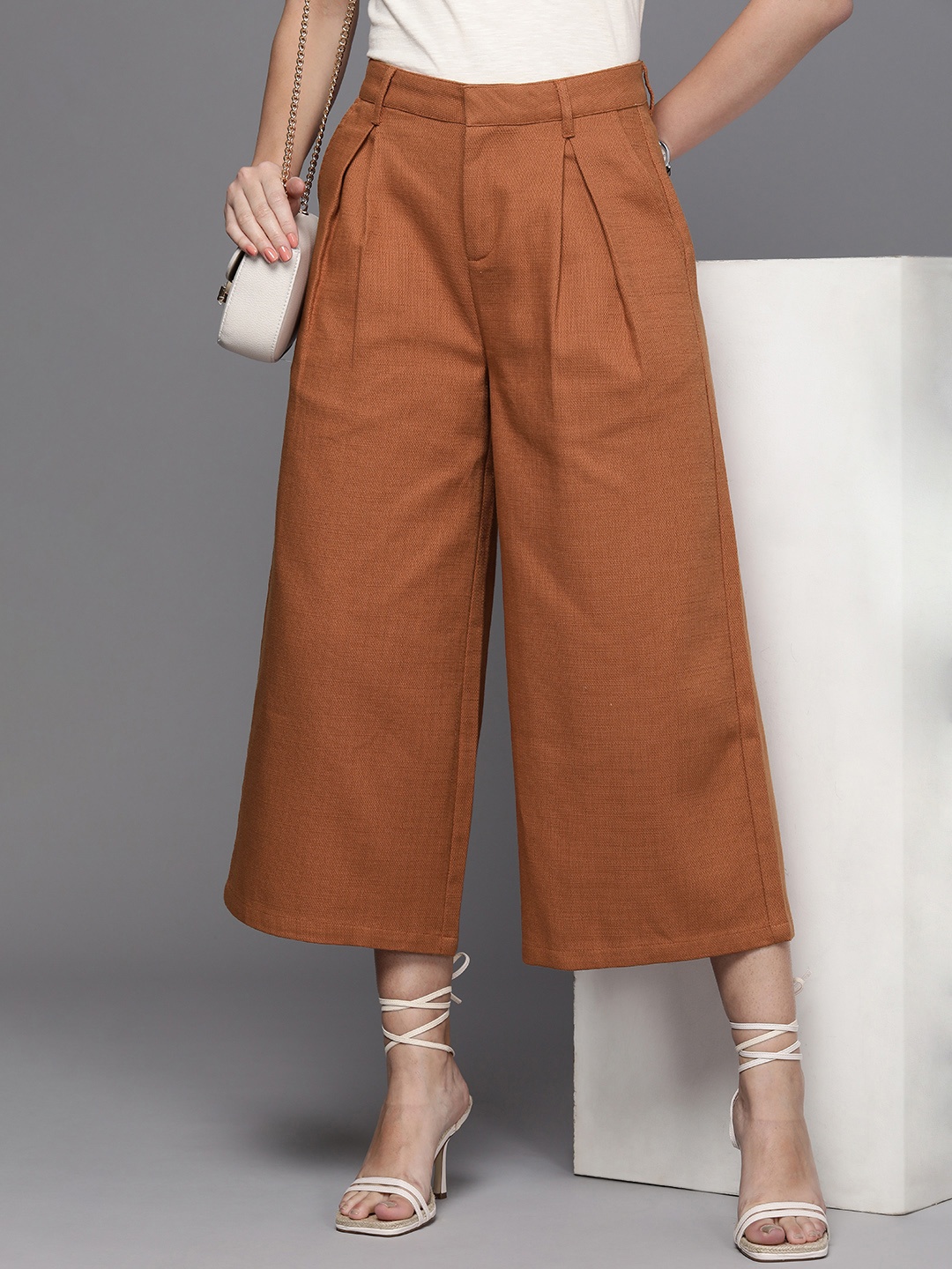 

Kenneth Cole Women Pure Cotton Textured Pleated Trousers, Rust