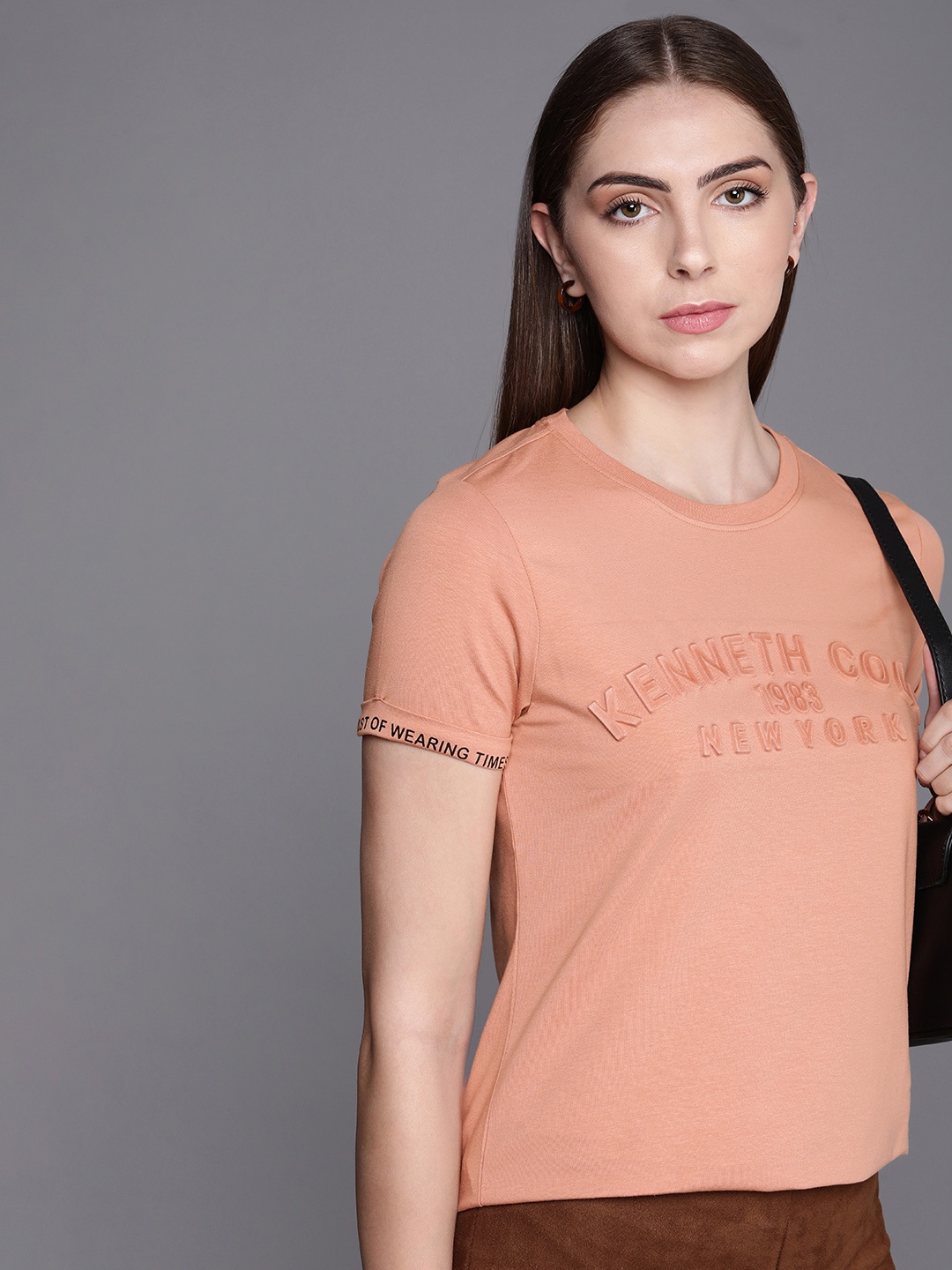 

Kenneth Cole Round Neck Typography Embossed Detail T-shirt, Pink