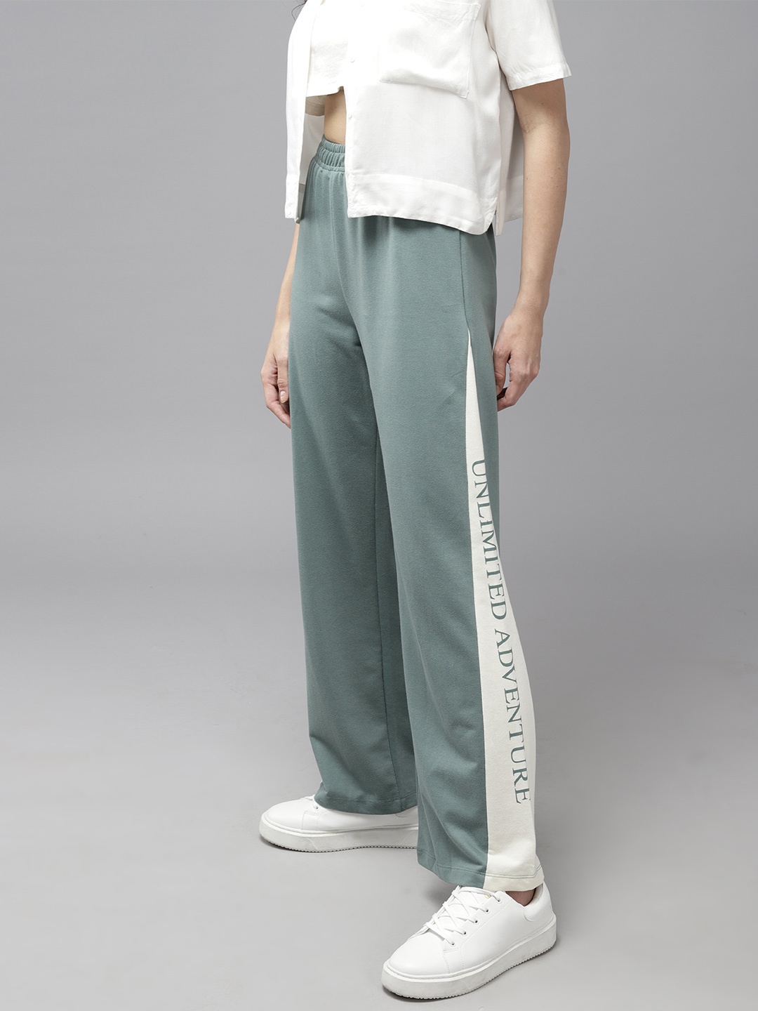 

The Roadster Lifestyle Co. Women Colourblock & Typo Detail Regular Track Pants, Blue