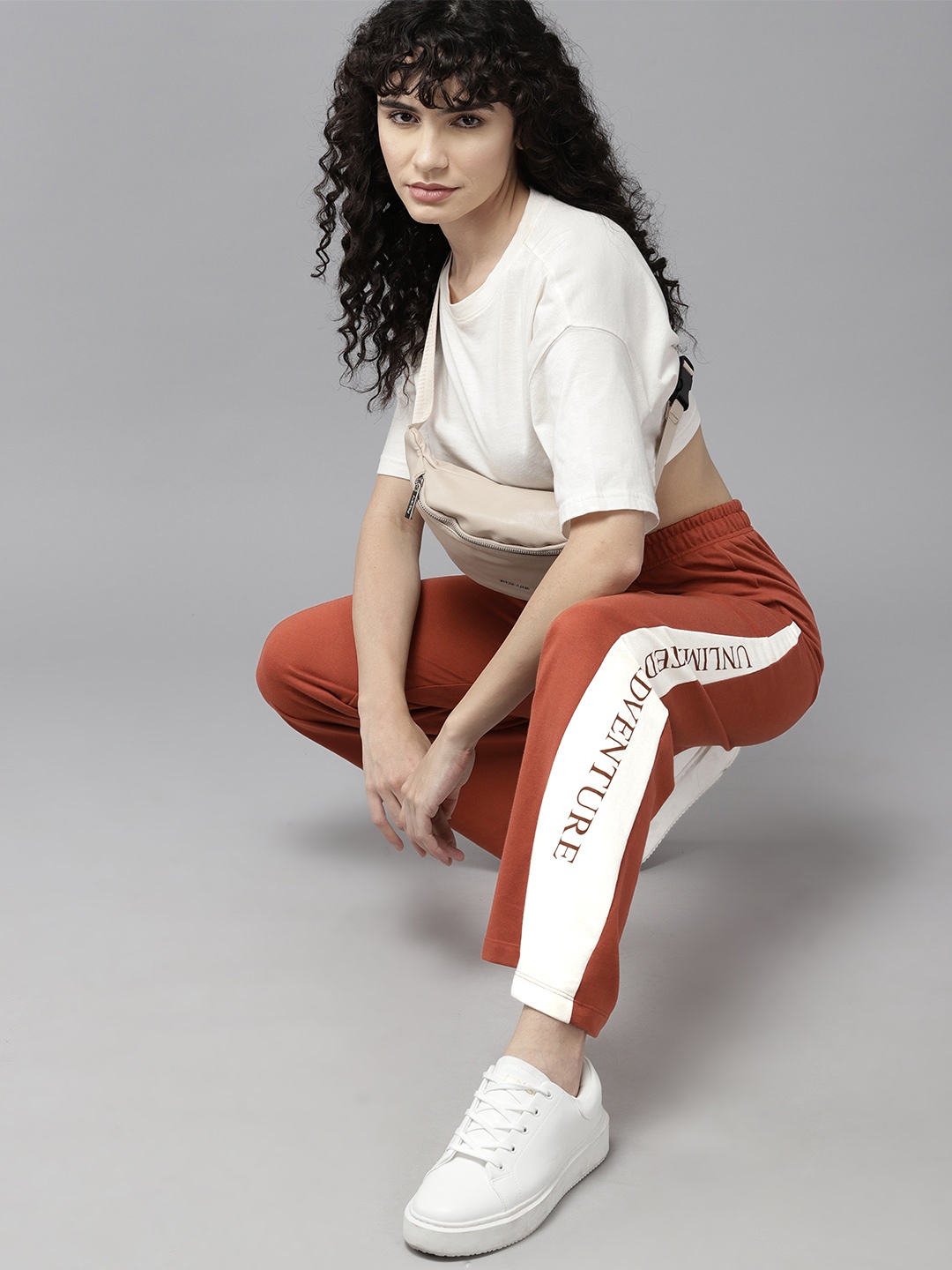 

The Roadster Lifestyle Co. Women Colourblock & Typo Detail Regular Track Pants, Rust