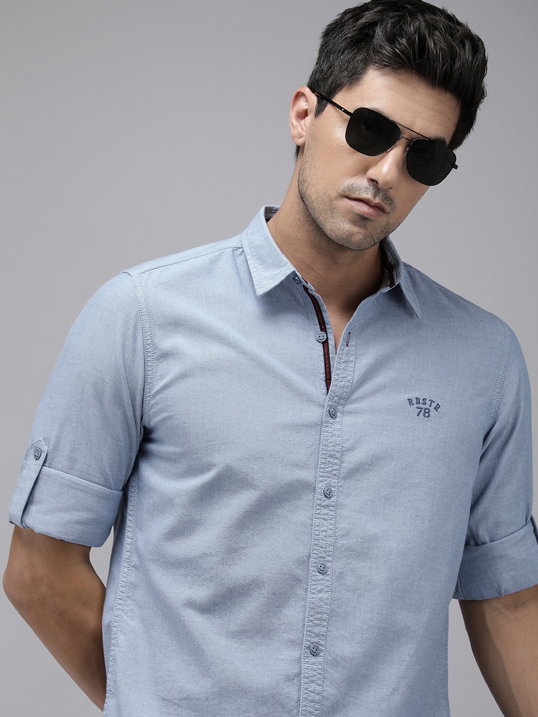 

The Roadster Lifestyle Co. Men Pure Cotton Solid Roll-Up Sleeves Casual Shirt, Blue