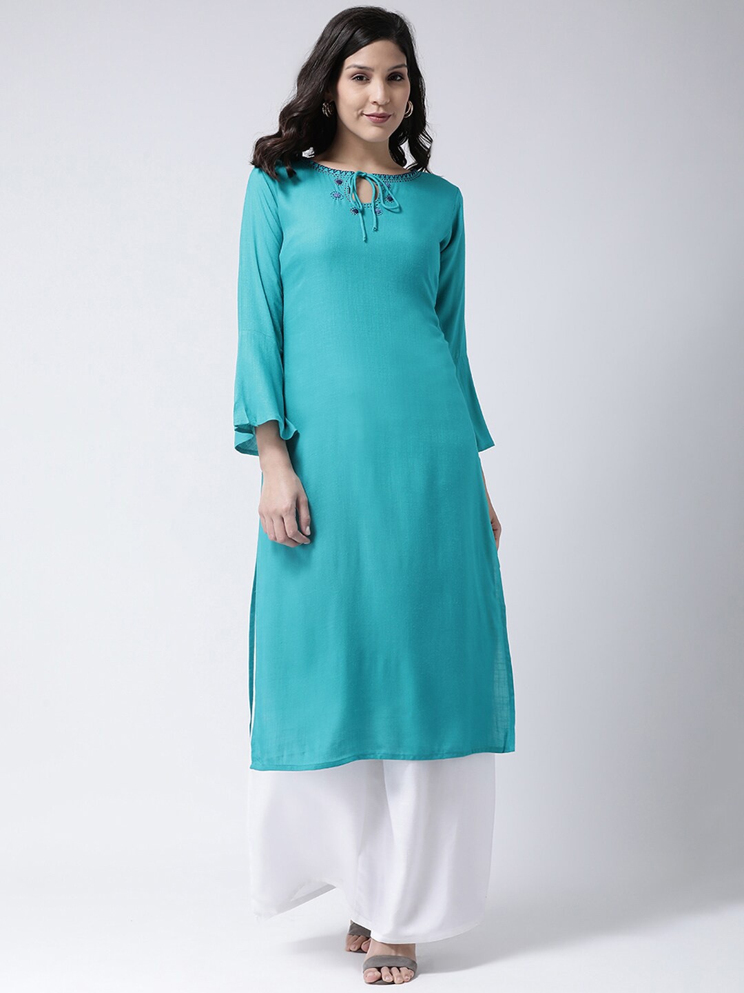 

Charitra Tie-Up Neck Floral Embroidered Kurta With Palazzos, Turquoise blue